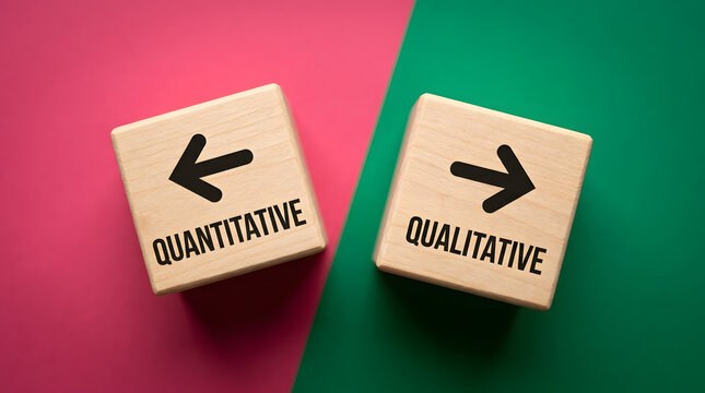 Wooden blocks labeled quantitative and qualitative with arrows on pink and green background