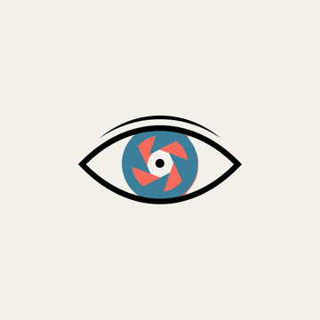 Minimalist graphic of an eye with a blue and red camera aperture iris, depicting precision targeting and strategic visual focus in a clean digital style