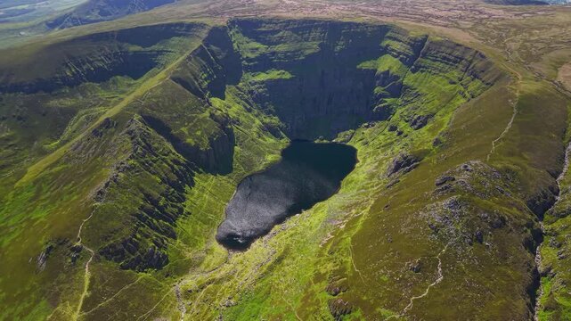 Stunning aerial landscape of Coumshingaun Lake, Comeragh Mountains, Ireland travel