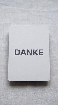 German Danke card on textured surface