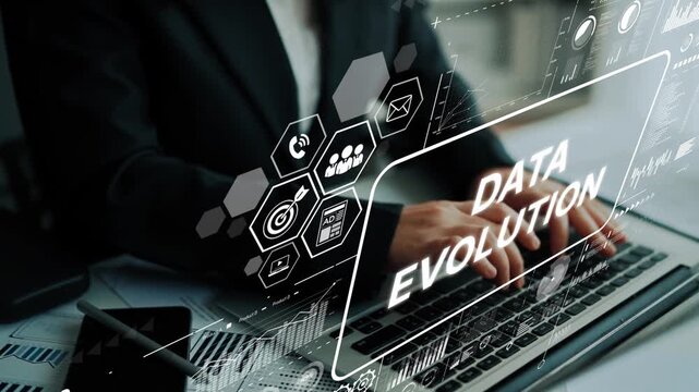 Professional woman using laptop with digital graphics illustrating data evolution and analytics trends in a modern office setting. Asymptotic smart data analytic.