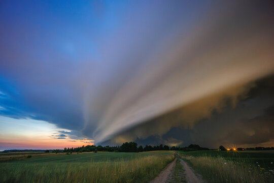 Angry supercell storm influenced by Climate change. Dangerous storm supercell shelf cloud with layers