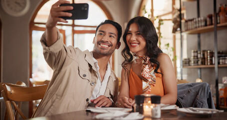 Couple, selfie and bonding on date in restaurant, connection and profile picture with partner on...