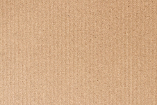 Brown cardboard sheet abstract background, texture of recycle paper box in old vintage pattern for design art work.