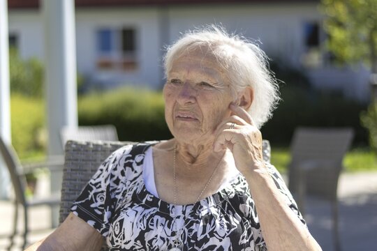 Thoughtful 86-year-old woman, retirement home, Jettingen, Baden-W&uuml;rttemberg, Germany