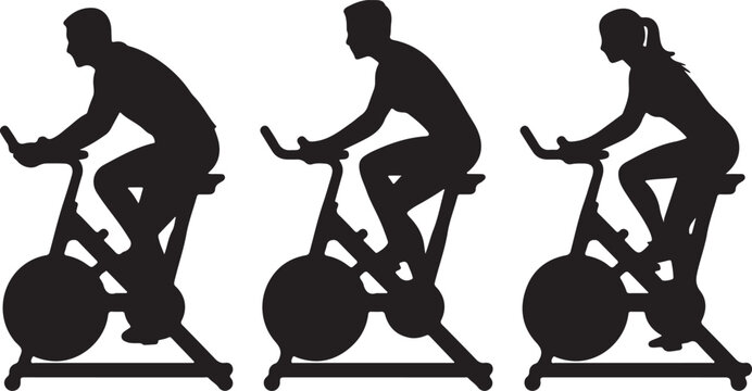 People training on stationary spin bikes in group class