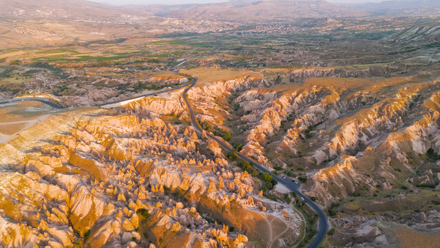 Goreme, Nevsehir, Turkey. Panoramic aerial view of Devrent Valley and surrounding Cappadocia landscape with unique rock formations and valleys.. Aerial View