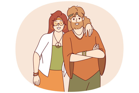 Hippie man and woman stand in embrace and smile, rejoicing at presence of free youth subculture. Two hippies with pacific symbol on necks call for informal lifestyle and to be non-conformist