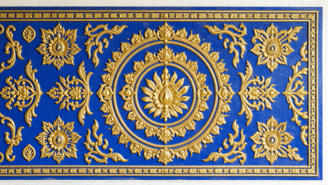 Gold Thai Floral Relief on Blue Background Wall Art