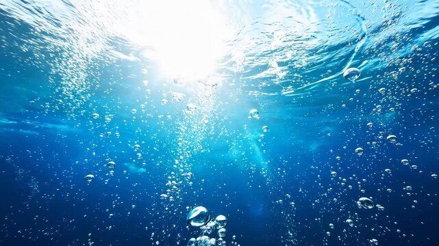Underwater View with Sunlight Beams and Rising Bubbles in Clear Blue Ocean