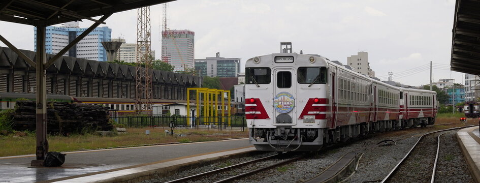 A Kiha 48 series diesel multiple unit commuter train pulls into Hua Lamphong station in Thai capital Bangkok
