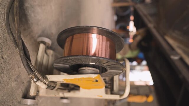 Copper Wire Spool in Industrial Machine, Closeup of Metal Wire Manufacturing, Factory Equipment with Copper Coil, Industrial Production Machinery Detail stock ivdeo.