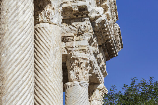Detailed view of decorated marble columns of Tetrapylon Gate in Aphrodisias, Geyre, Turkey