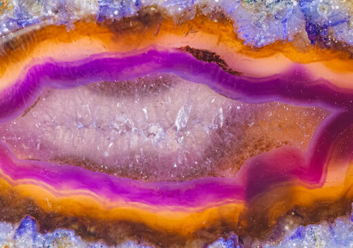 Macro view of colorful crystal and mineral textures showing layers and formations