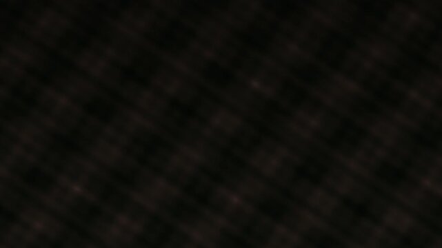 Abstract dark carbon fiber texture background with geometric pattern.