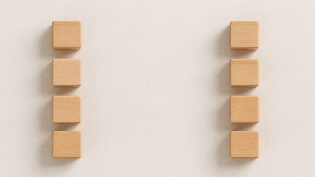 Two columns of wooden blocks on white background