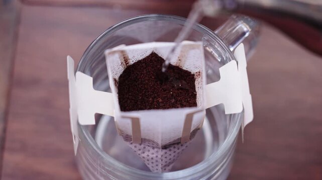 The whole process of brewing drip coffee with hot water