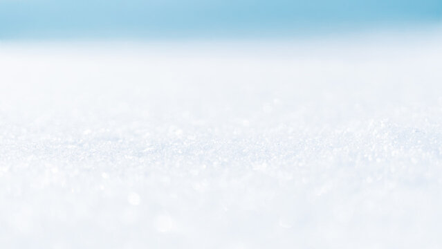 雪の輝きのキラキラとブルーの背景