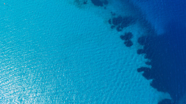 Aerial view of clear blue water sea at Nea Poteidaia Greece