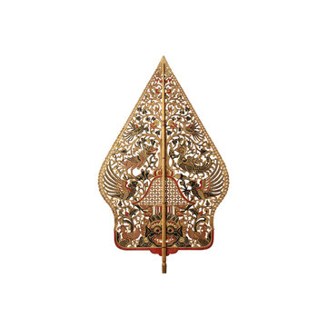 Carved Javanese gunungan wayang kulit puppet isolated on white background