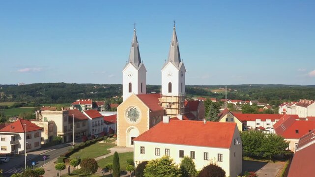 Aerial view of tower bells and church of St. Mary Magdalene in town of Cazma, Moslavina, Croatia