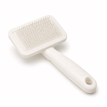 White pet grooming and hair removal brush with handle