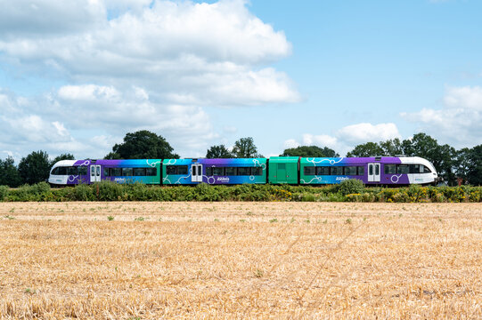 Lievelde, Gelderland, Netherlands, Comuter modern passenger train traveling through dutch countryside