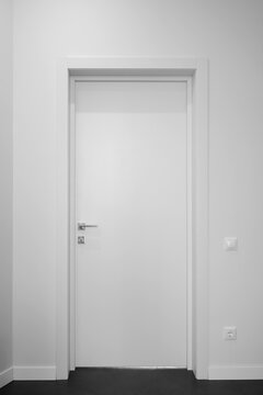 White interior door in hallway
