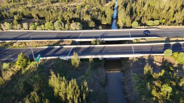 Aerial View of Highway Bridge Over Creek in Rural Australia