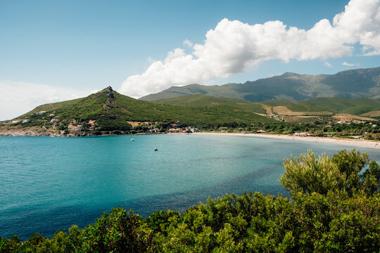 Mediterranean sea beach landscape with mountain background, Corsica