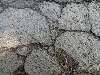 Obraz premium Cracked Concrete Surface Texture with Rough Weathered Cement Pattern