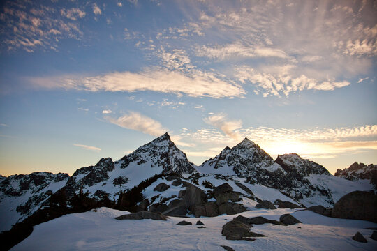 Majestic snow capped mountains at dawn