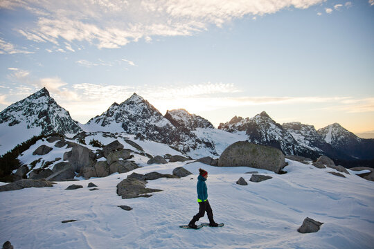 Snowshoer walking through a snowy mountain pass, Cheam Range