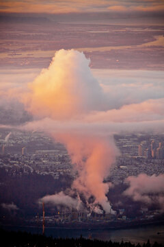 smoke and pollution rises from an oil refinery in Burnaby, B.C.