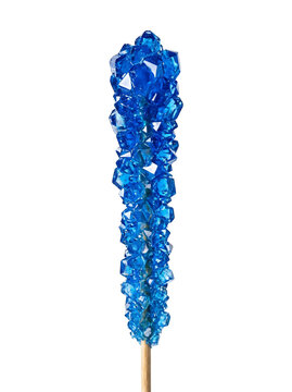 Blue rock candy lollipop on wooden stick with transparent background isolated.