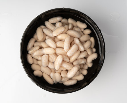 Soaked white beans, legume seeds in water