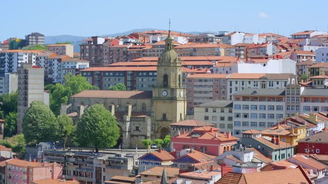 European cityscape with ancient church and rooftops