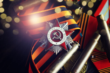 Fototapeta premium The Soviet order of the Second World war, Victory Day 9 May postcard concept, toned vintage