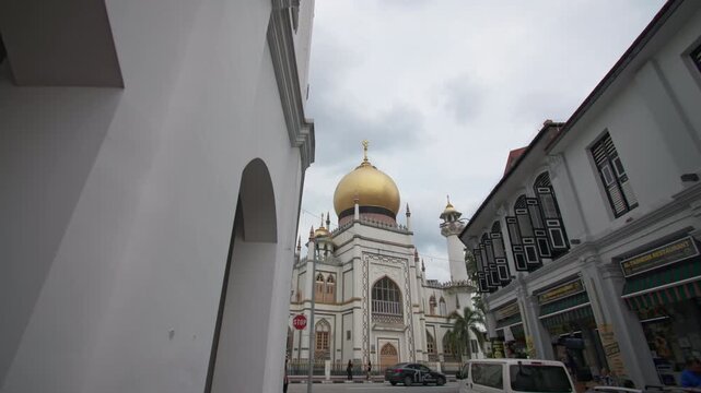 Magnificent Sultan Mosque in Singapore city with golden domes elegant minaret and historic Islamic architecture surrounded by vibrant urban scenery and tourism in Asia