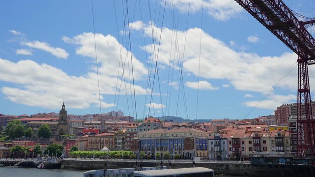 Vizcaya bridge transporter moving across nervion river