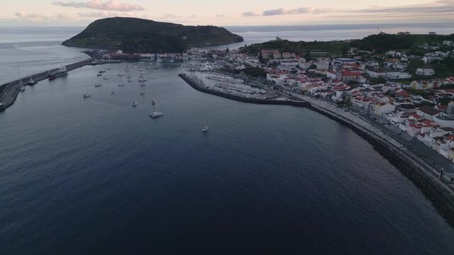Aerial view of Horta marina and waterfront buildings at dusk on Faial Island, Azores