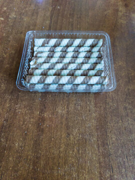 Flat Lay Shot of Sweet Crisp Wafer Roll Snacks in Plastic Tray