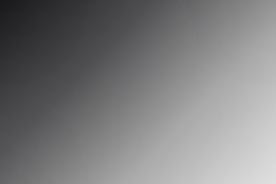 Monochrome Grey Diagonal Gradient Background with Soft Glow