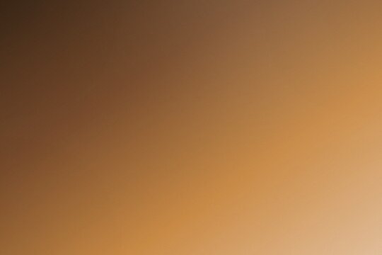 Warm Earth Tone Diagonal Gradient Background with Soft Glow
