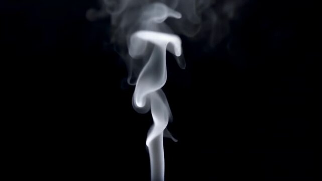Elegant white smoke plume rising and swirling against a dark black background.
