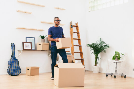 Young man moving in