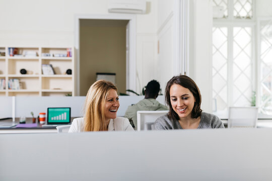 Young people working in start up company