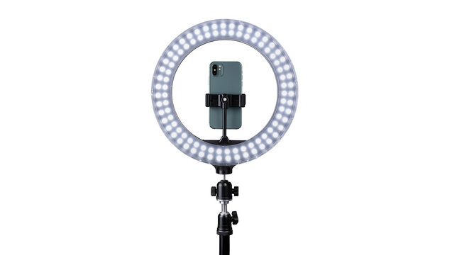 Bright LED ring light with mounted smartphone, isolated on transparent background