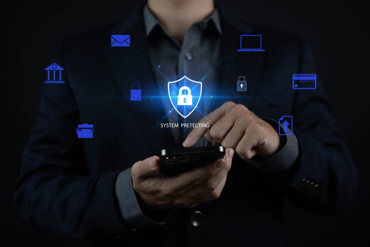 Business professional using smartphone with cybersecurity protection interface, symbolizing data security, mobile protection, secure network, digital privacy, encryption, cyber defense, and secure acc