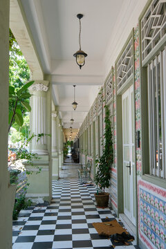 'Five-foot' passage way along row of conserved pre-war terrace houses designed in Chinese Baroque style with neo-classical and Peranakan features, Petain Road, Singapore